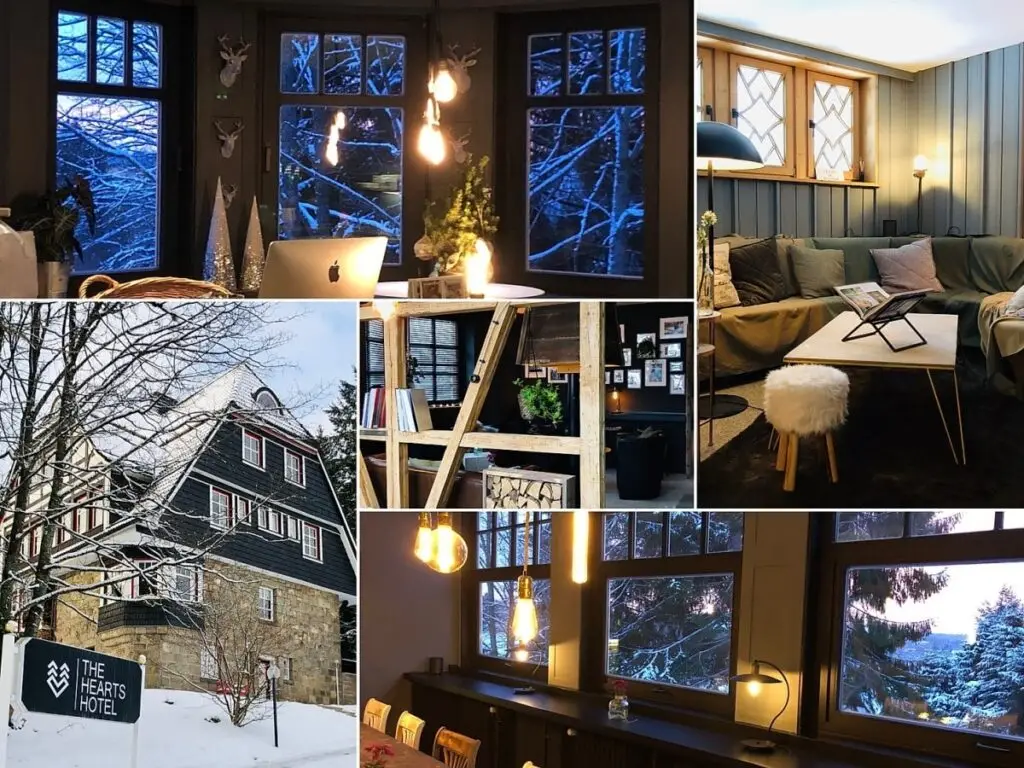 Bild eines winterlichen Hotels mit Fenstern, schneebedecktem Außenbereich, gemütlichen Innenräumen und liebevoller Einrichtung.